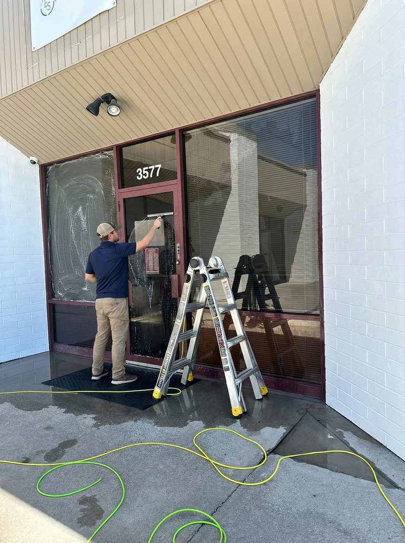 Professional crew working on commercial window cleaning project